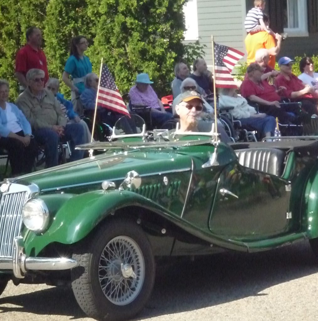 Here's my dad driving in a small-town Memorial Day parade.