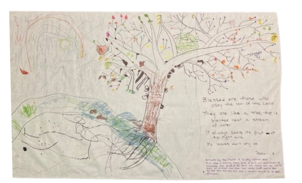 A poster of a well nourished tree by the riverside growing every kind of fruit, drawn by Sunday school kids.